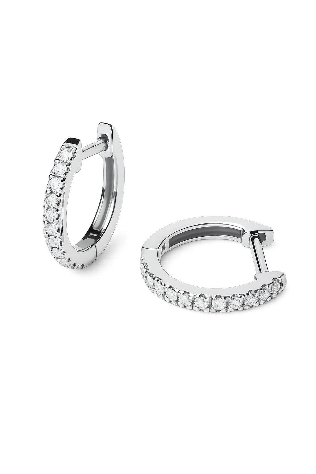 A pair of silver huggie hoop earrings embellished with clear pavé-set round stones, shown on a clean white background.