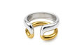 A two-tone metal cuff ring featuring a polished silver outer band and a gold inner band, shown on a clean white background.